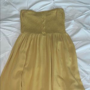 Yellow strapless mini dress
